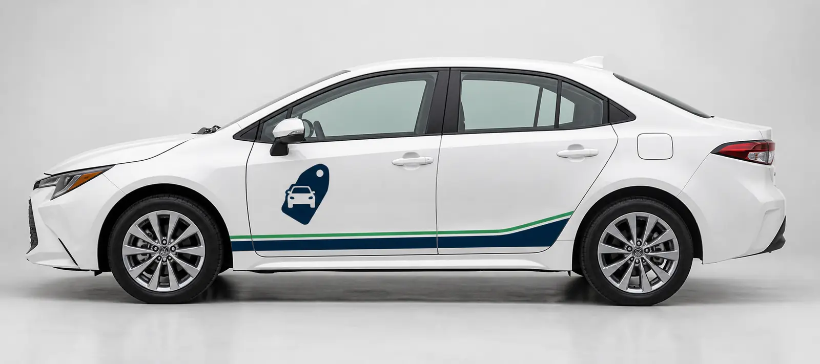 White Toyota Corolla with Budget Cruze navy and green side livery